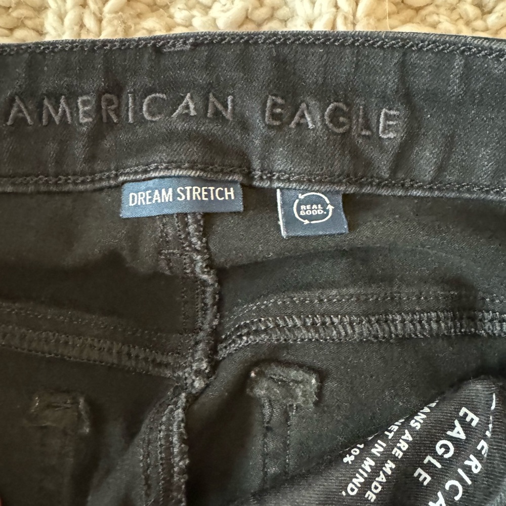 Brand new black American Eagle dream jean skinny jeans. Size 8 long